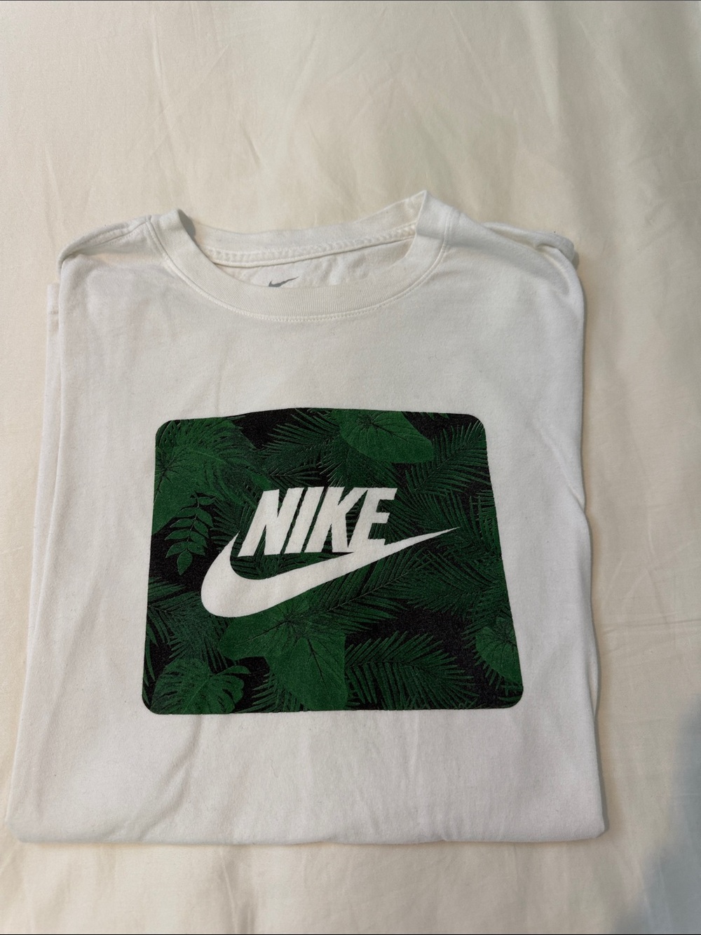Nike White Tee with Green and Black Tropical Logo